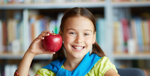 Boise-Riverview-Dental-Girl-With-Apple-SliderLong